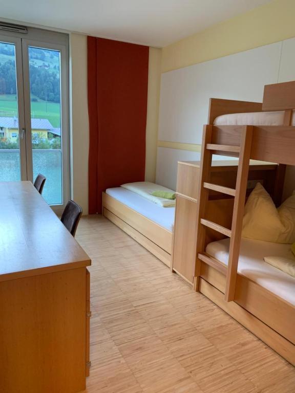 Postel nebo postele na pokoji v ubytování Hostel-Jugendherberge St. Johann im Pongau