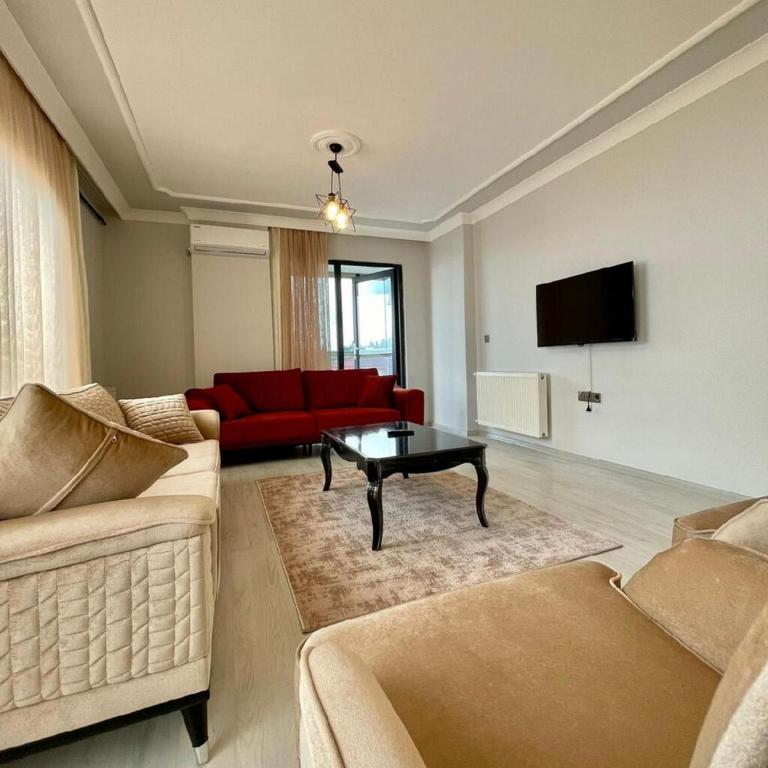 Posezení v ubytování Shahin Golden Hotel الصقر الذهبي للشقق الفندقية