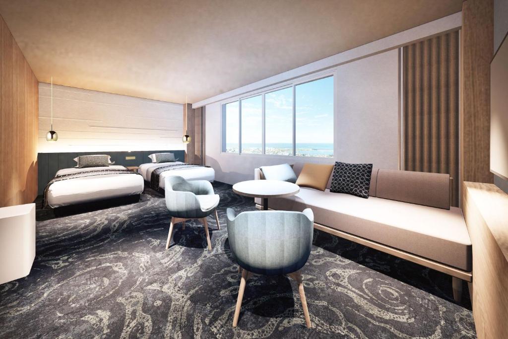 Postel nebo postele na pokoji v ubytování KAMENOI HOTEL Awajishima