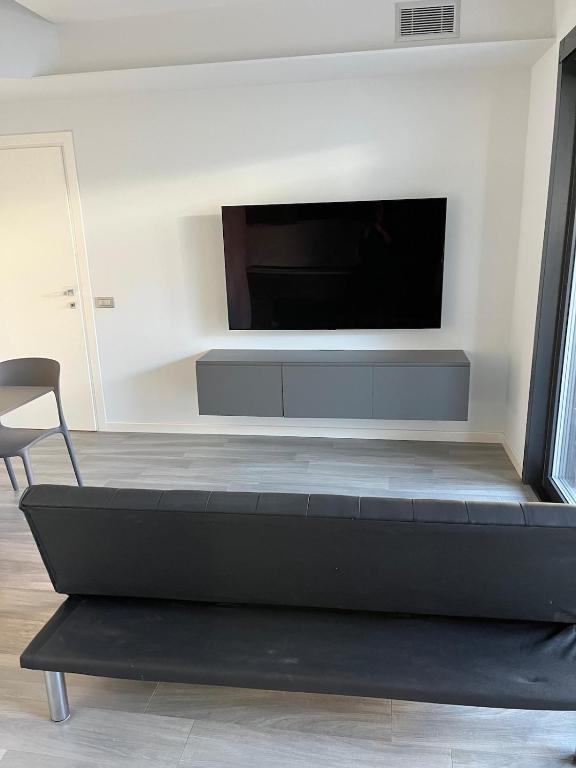 TV a/nebo společenská místnost v ubytování Casa Darcellas trilocale in a4 con giardino