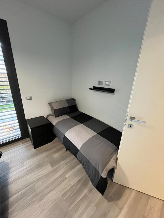 Postel nebo postele na pokoji v ubytování Casa Darcellas trilocale in a4 con giardino