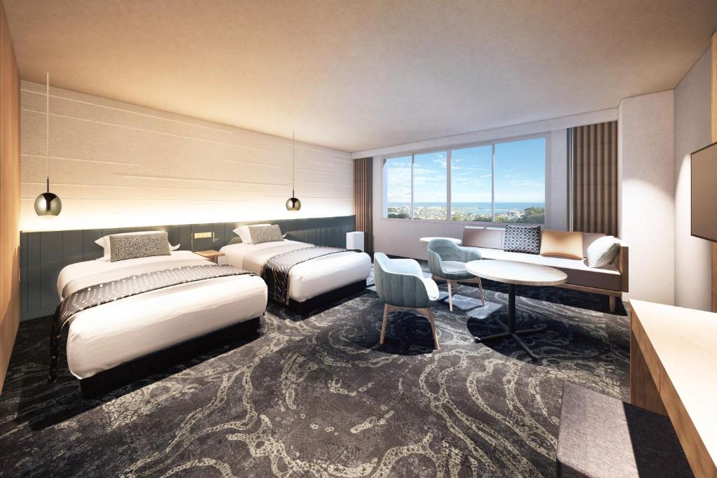 Postel nebo postele na pokoji v ubytování KAMENOI HOTEL Awajishima