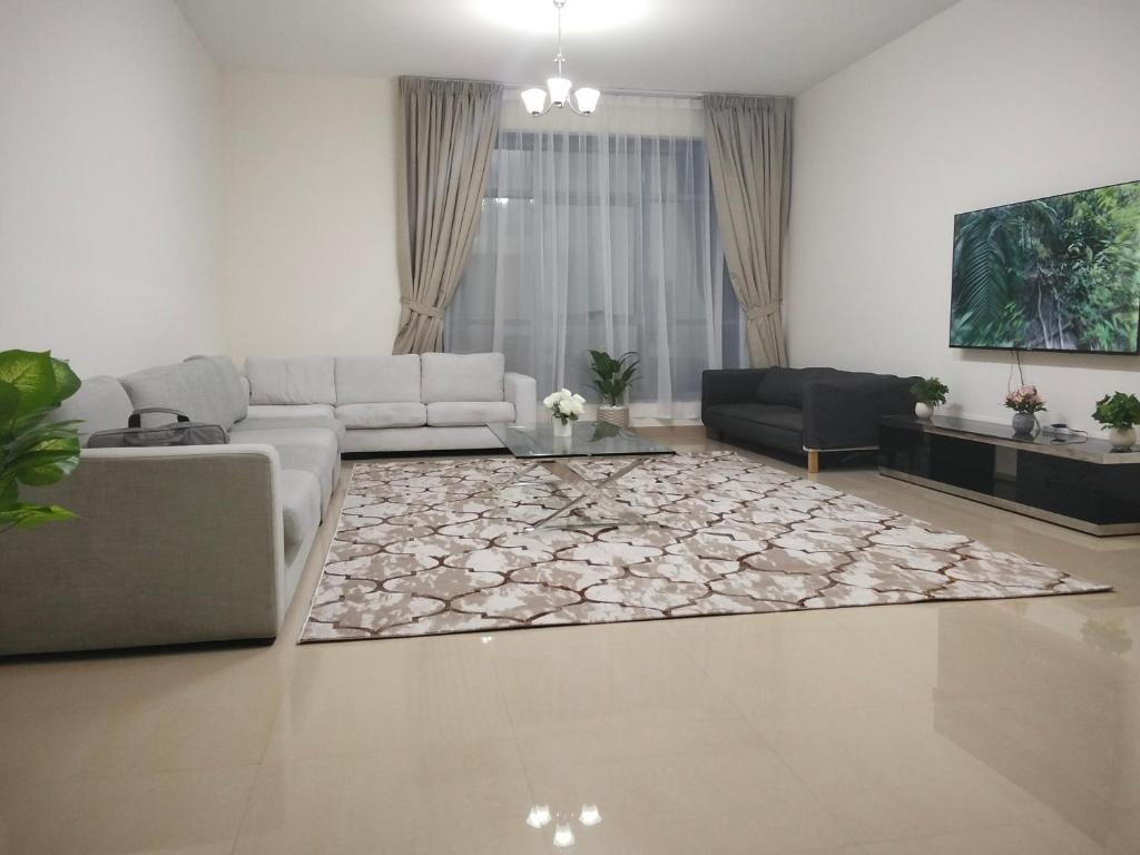 Prostor za sedenje u objektu Al Khor Tower Apartment