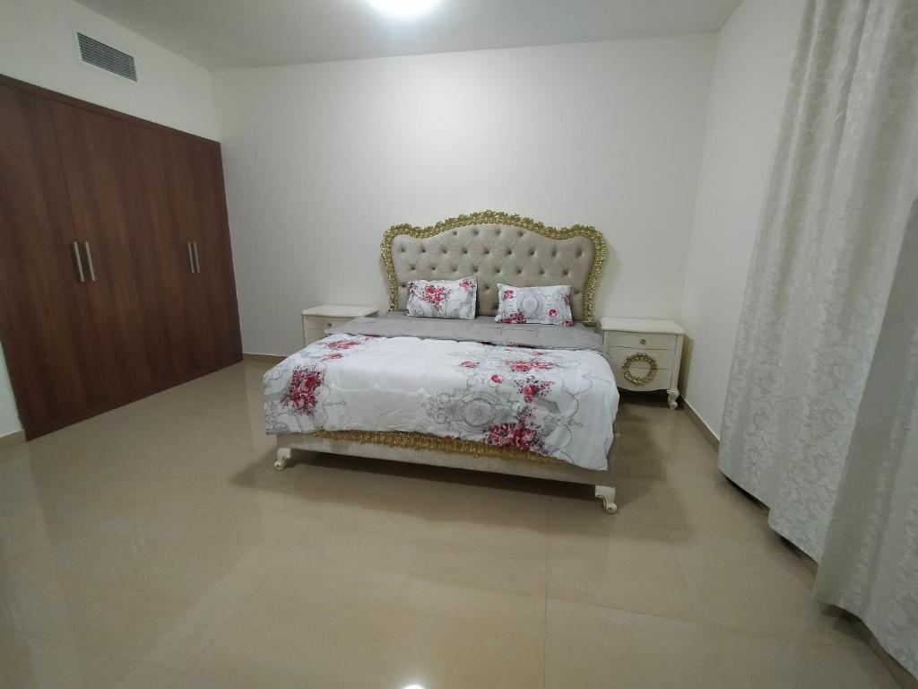Krevet ili kreveti u jedinici u okviru objekta Al Khor Tower Apartment