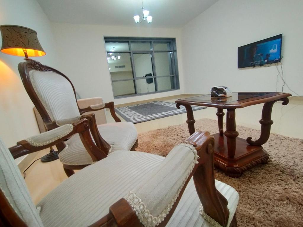 TV i/ili multimedijalni sistem u objektu Al Khor Tower Apartment