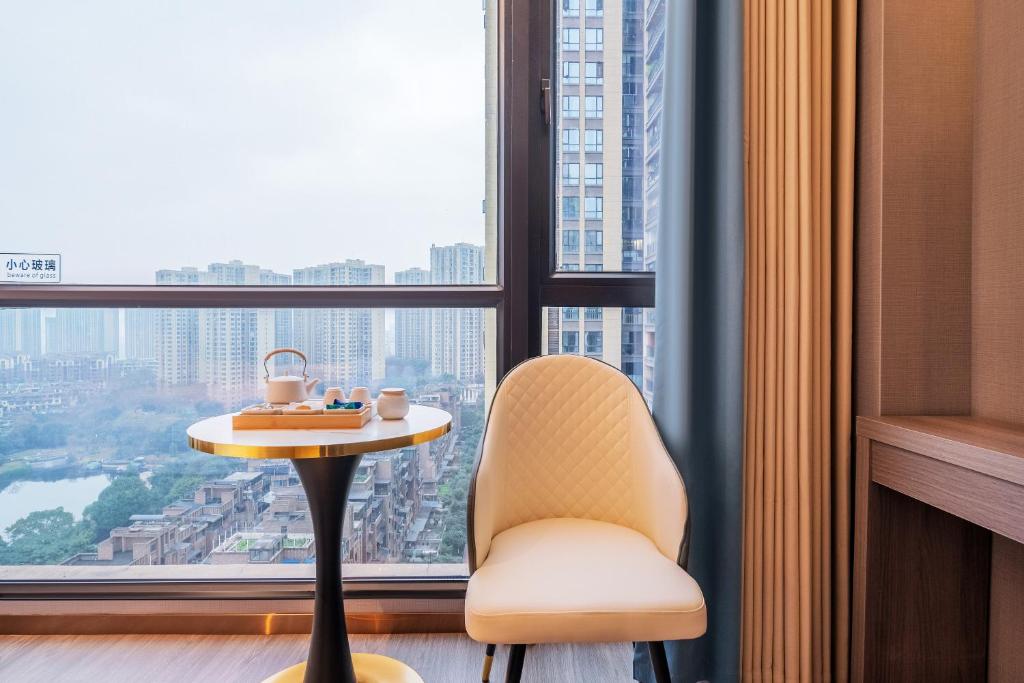 Posezení v ubytování ChongQing Could Hotel 重庆云禧酒店