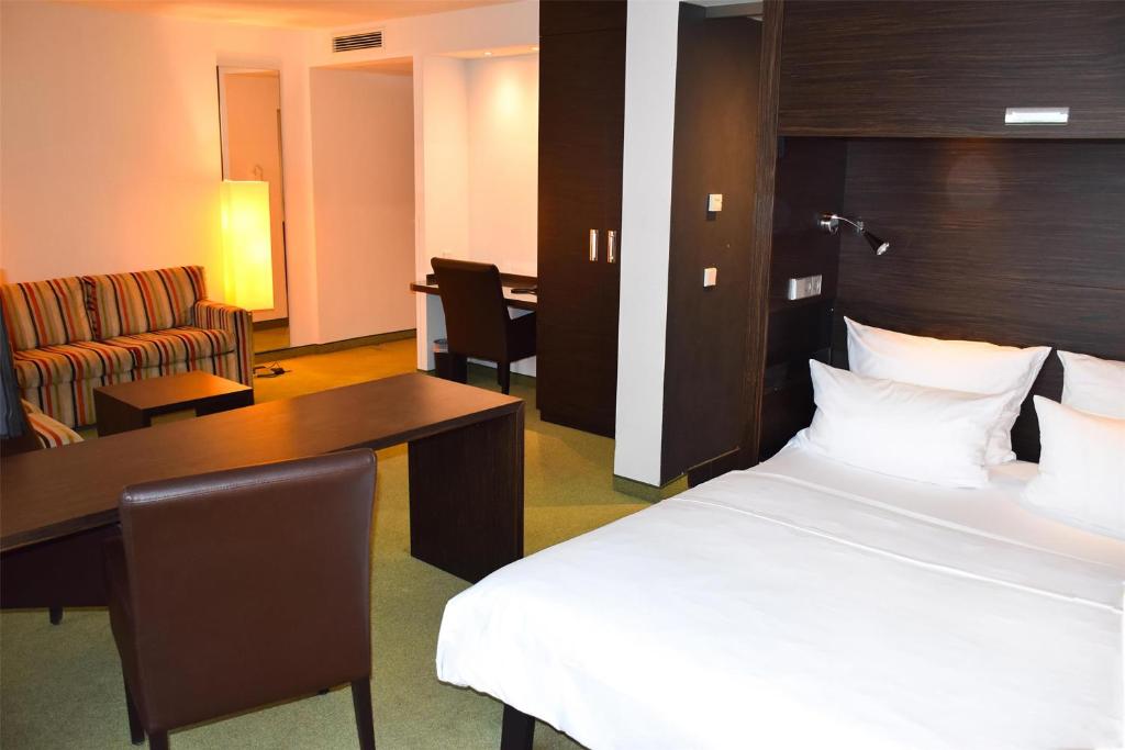 Postel nebo postele na pokoji v ubytování Radisson Blu Park Hotel & Conference Centre