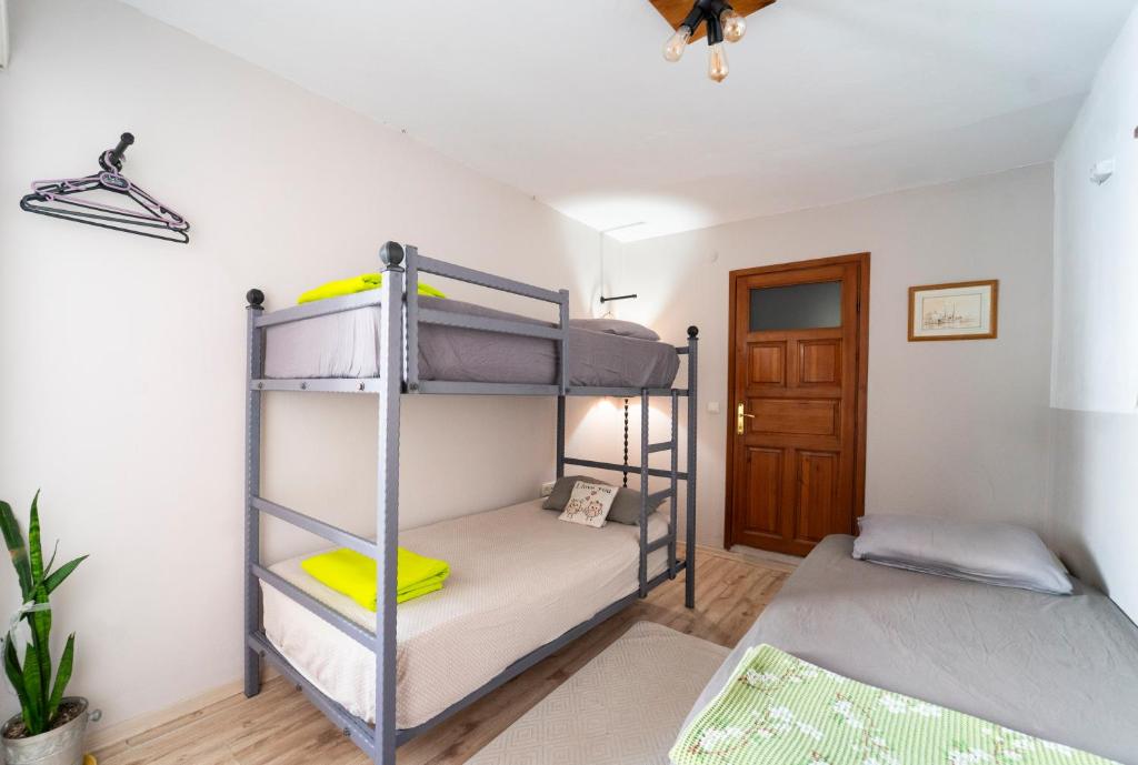 Postel nebo postele na pokoji v ubytování La Luna Hostel