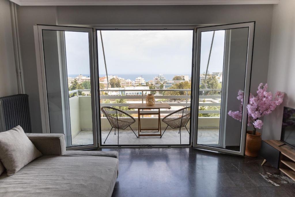 A seating area at Panoramic Apartment