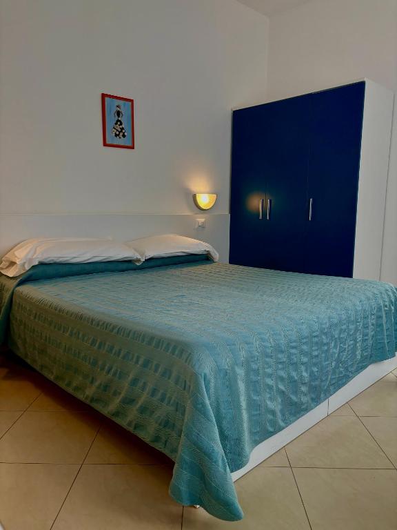 Postel nebo postele na pokoji v ubytování Hotel Fortuna
