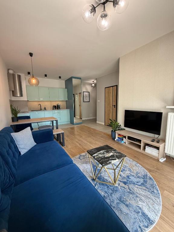 Televízia a/alebo spoločenská miestnosť v ubytovaní Jacuzzi Apartamenty Gdańsk - RELAX Apartments