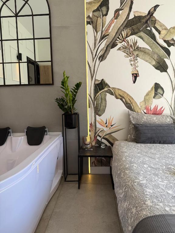 Posteľ alebo postele v izbe v ubytovaní Jacuzzi Apartamenty Gdańsk - RELAX Apartments