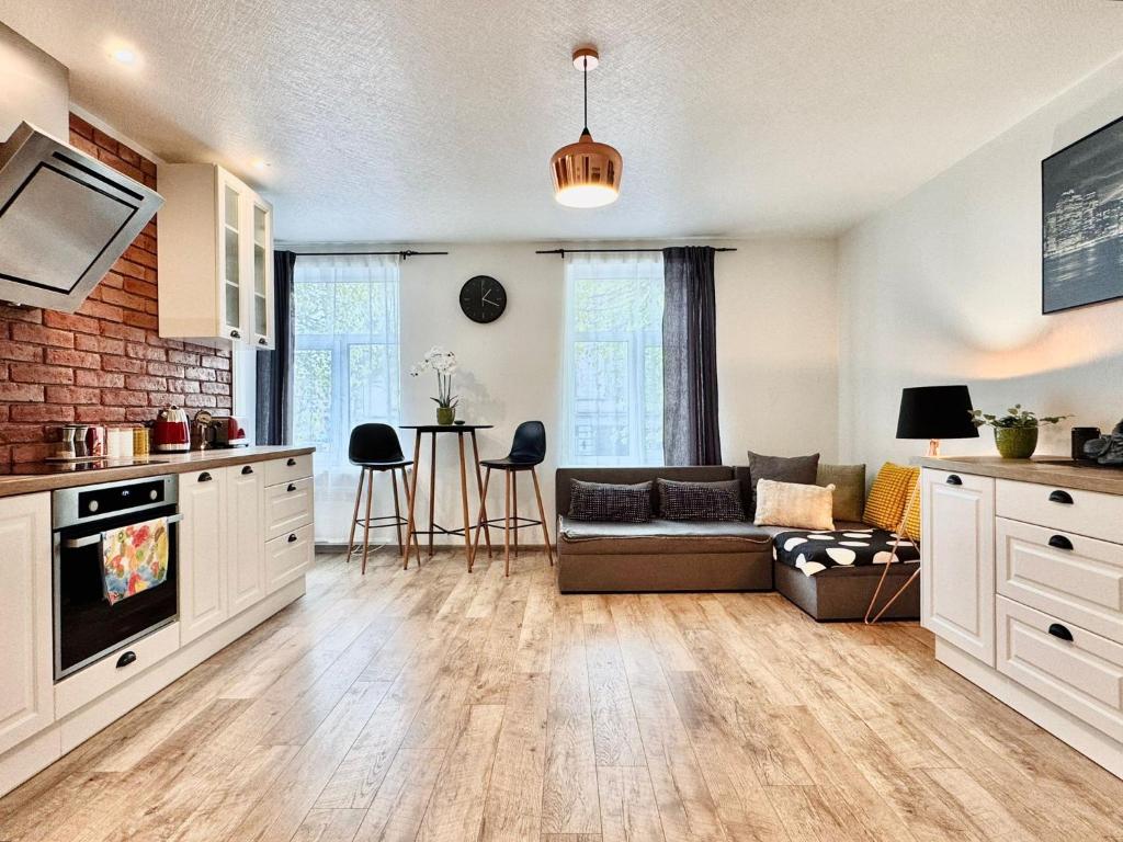 Kuchyň nebo kuchyňský kout v ubytování Old town city apartment