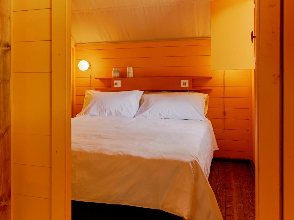 Postel nebo postele na pokoji v ubytování Braccialieri Luxury Resort