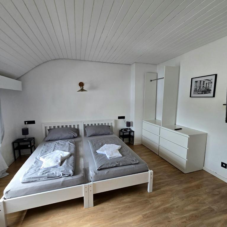 Postel nebo postele na pokoji v ubytování work & stay house in Linz
