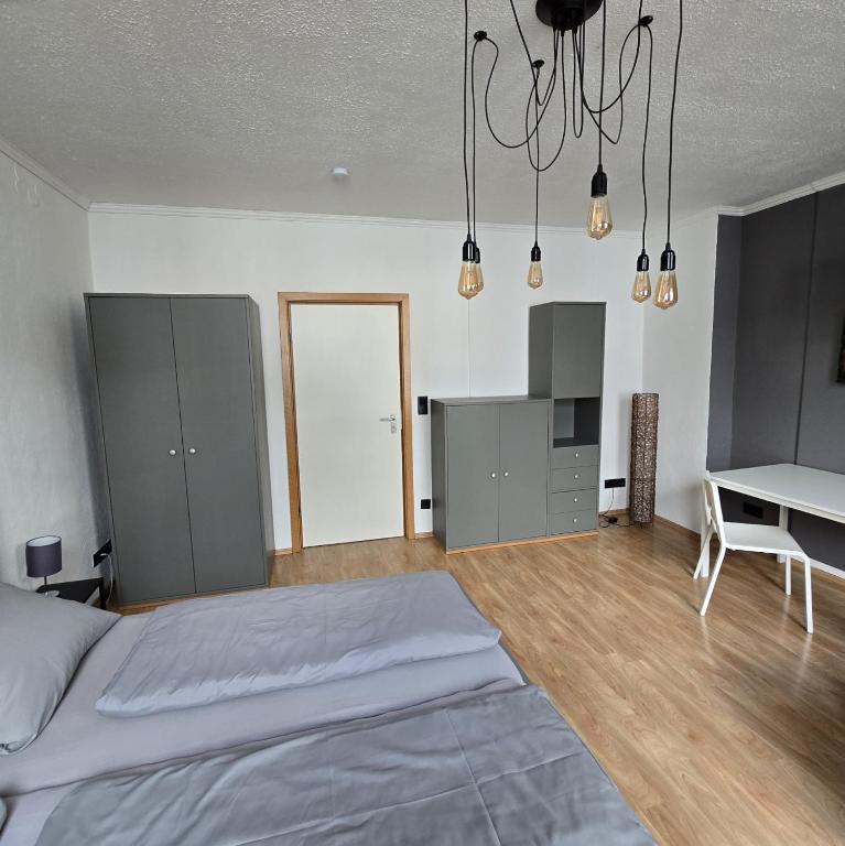 Postel nebo postele na pokoji v ubytování work & stay house in Linz