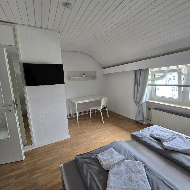 Postel nebo postele na pokoji v ubytování work & stay house in Linz