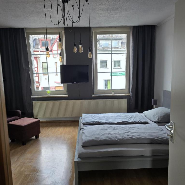 Postel nebo postele na pokoji v ubytování work & stay house in Linz