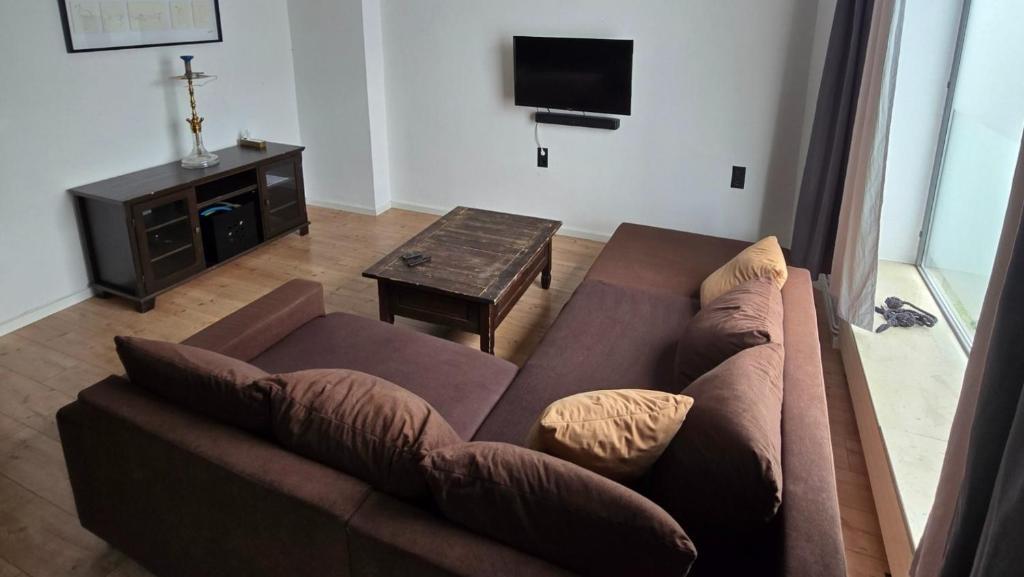 TV a/nebo společenská místnost v ubytování work & stay house in Linz