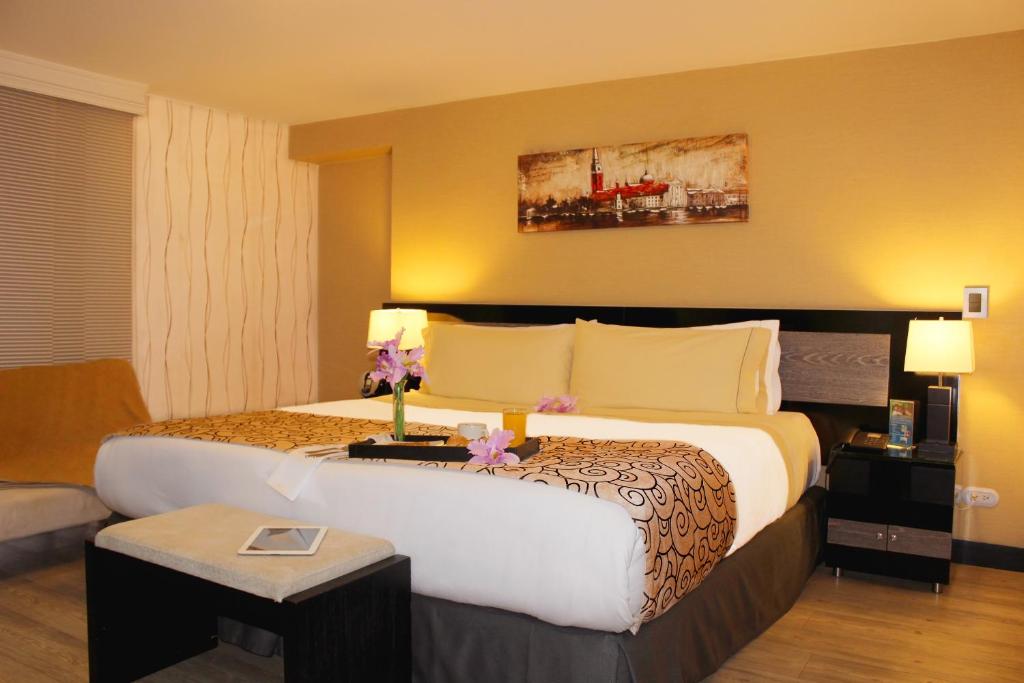 Postel nebo postele na pokoji v ubytování Hotel Bogota Expocomfort - Embajada Americana