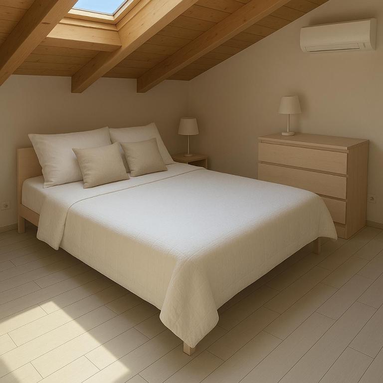 Łóżko lub łóżka w pokoju w obiekcie B&B La Chiave