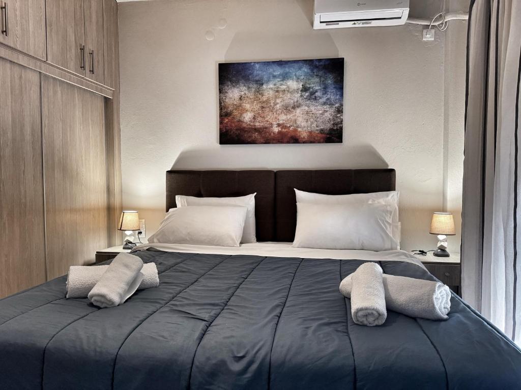 Giường trong phòng chung tại Dreams Street Apartment
