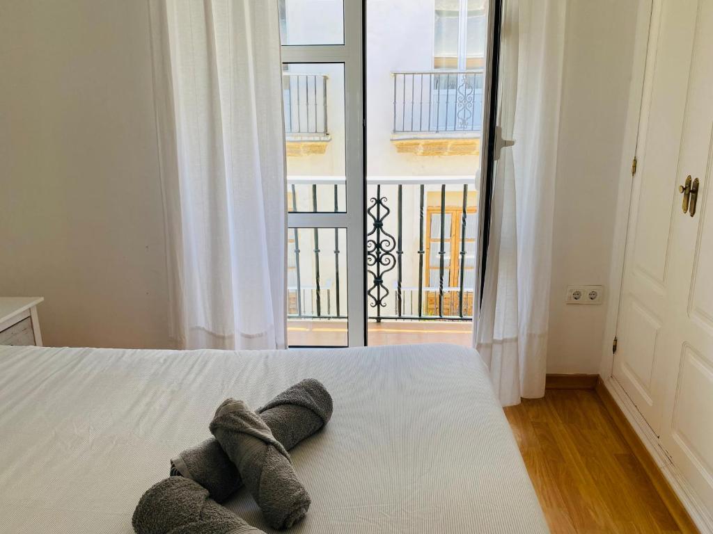 Posteľ alebo postele v izbe v ubytovaní Ático Cádiz Centro