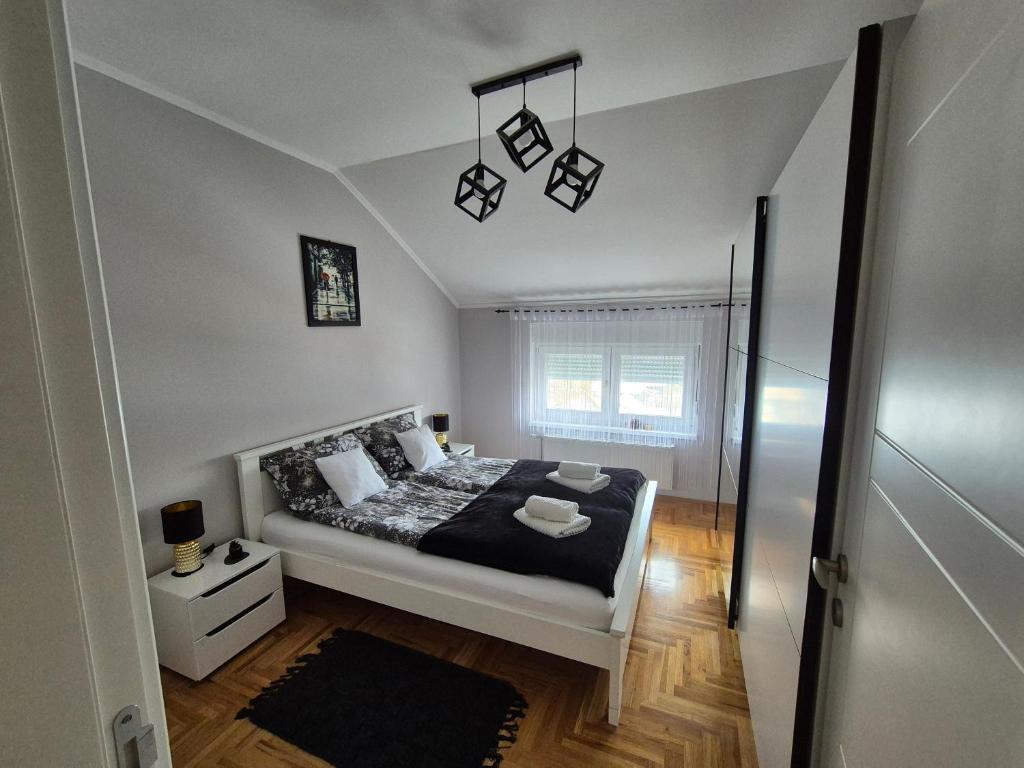 Postel nebo postele na pokoji v ubytování Queen Deluxe