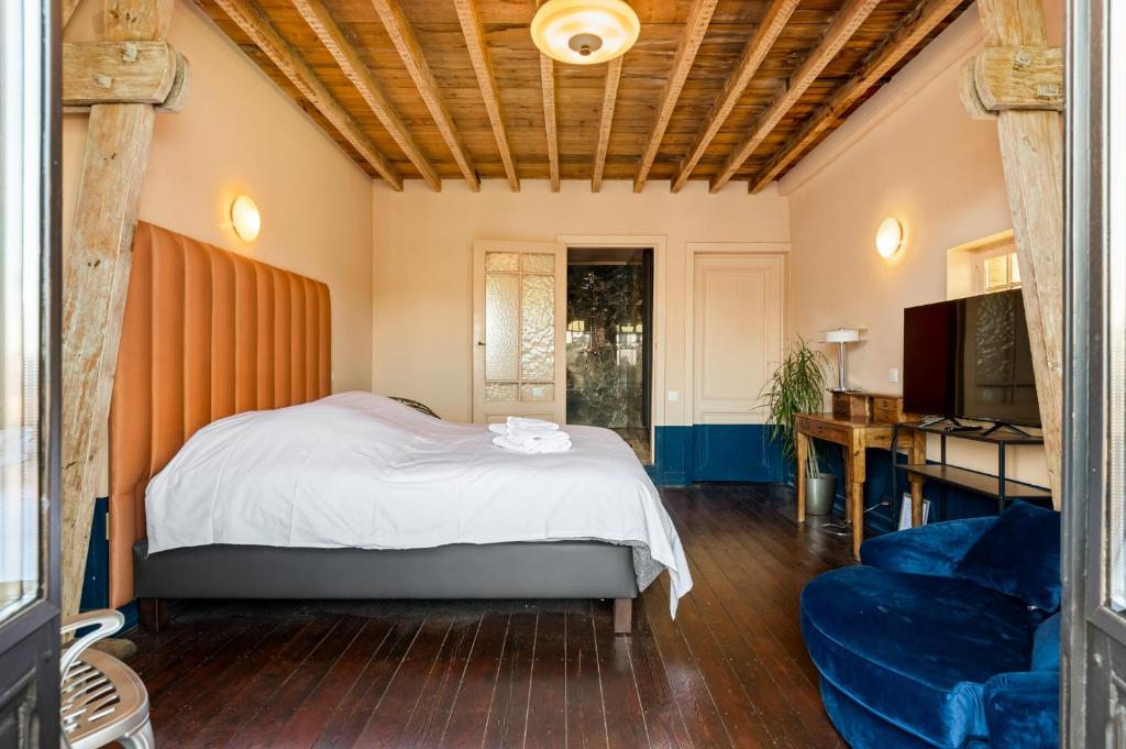 Postel nebo postele na pokoji v ubytování Boutique B&B Baron Osy
