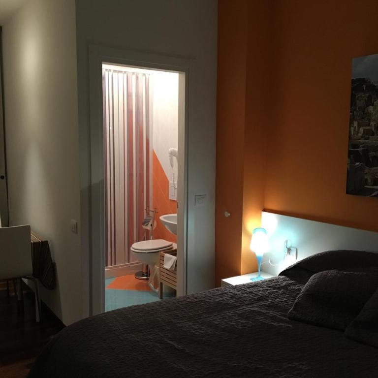 Letto o letti in una camera di amaranto bnb