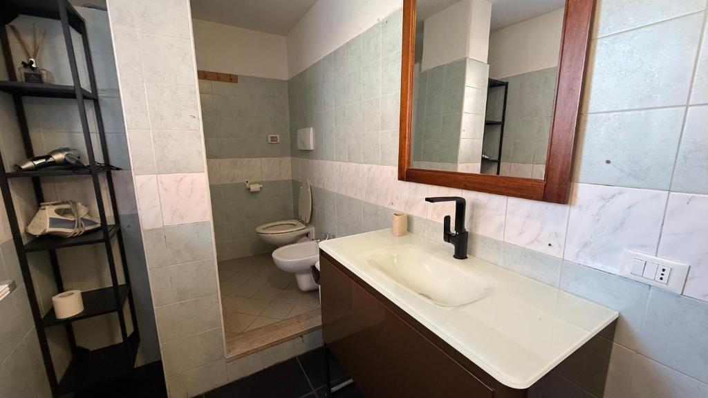 Koupelna v ubytování DeHomes - Relax & Business Apartments