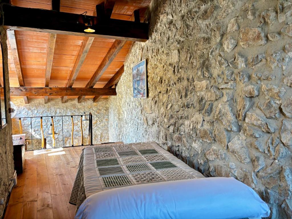 Postel nebo postele na pokoji v ubytování Villa with pool Can Tomeu in Es Capdellà