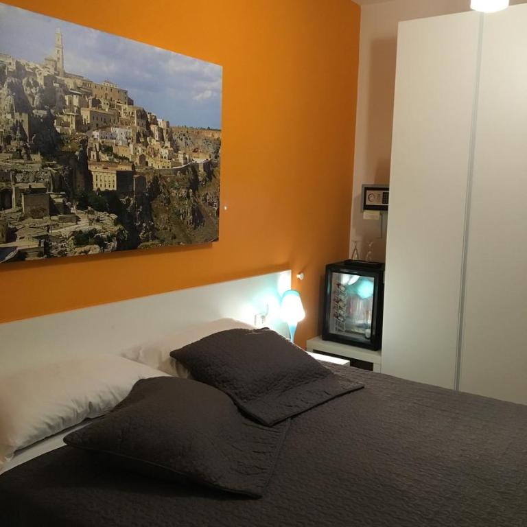 Letto o letti in una camera di amaranto bnb