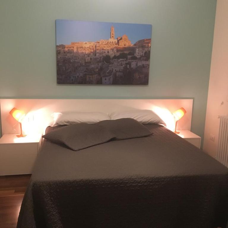 Letto o letti in una camera di amaranto bnb