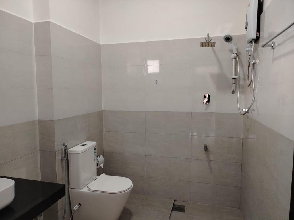 Koupelna v ubytování Diora Hotel