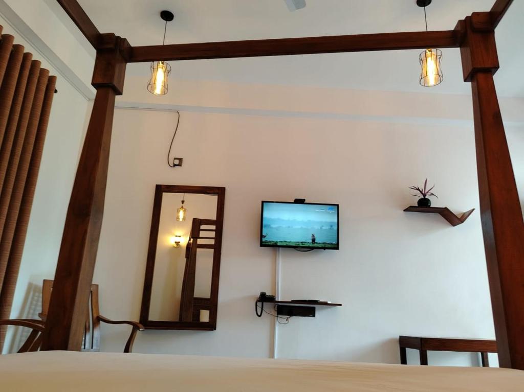 TV a/nebo společenská místnost v ubytování Diora Hotel