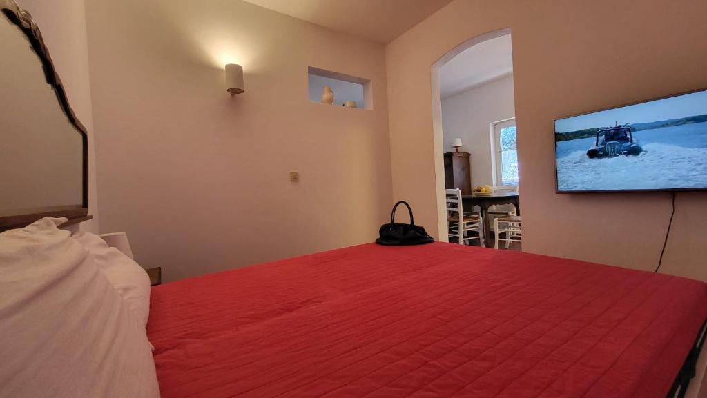A television and/or entertainment centre at Perla di Mare