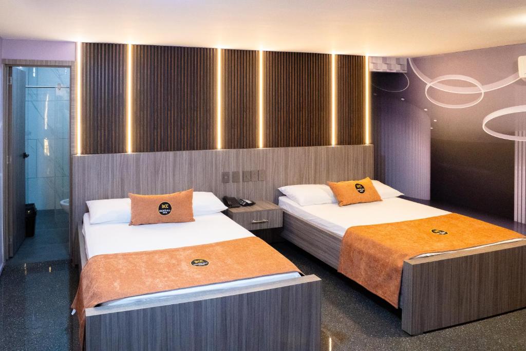 Postel nebo postele na pokoji v ubytování Hotel Bacatá Isla
