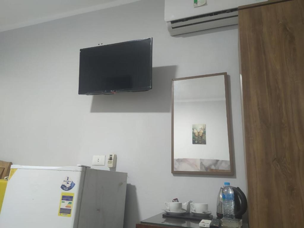 Kuchyň nebo kuchyňský kout v ubytování فندق هابى دريمز
