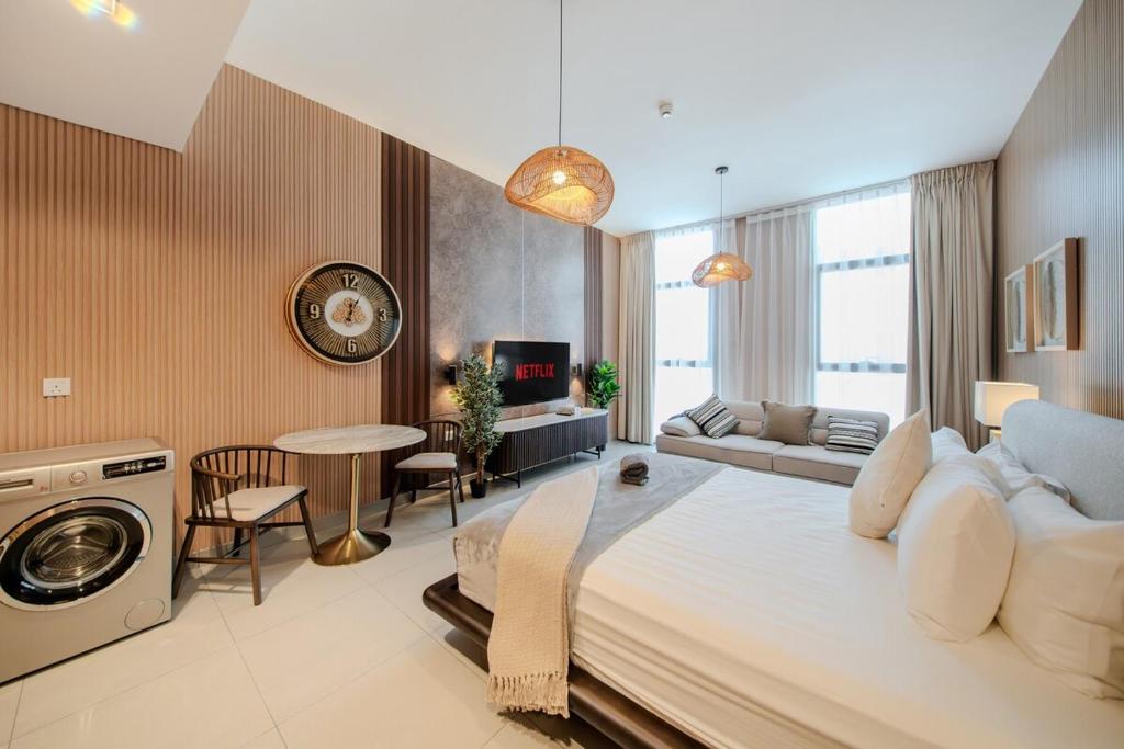 En eller flere senge i et værelse på The Snug Studio By BlueCloud Holidays