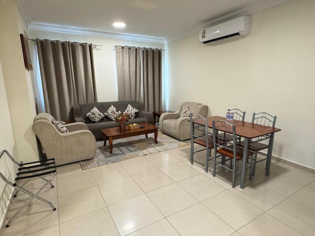 Posezení v ubytování Al Murooj Hotel Apartments