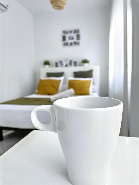 Cama o camas de una habitación en Como en casa