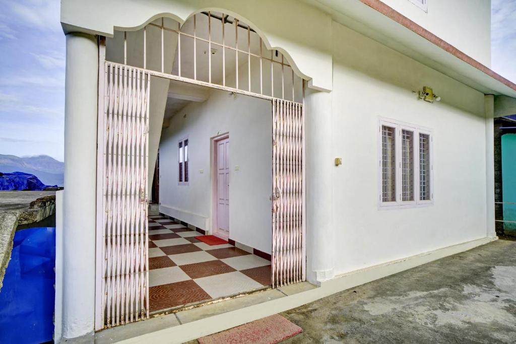 Fotografie z fotogalerie ubytování Hotel O Lulu Home v destinaci Munnar