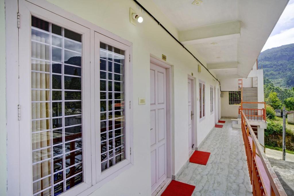 Fotografie z fotogalerie ubytování Hotel O Lulu Home v destinaci Munnar