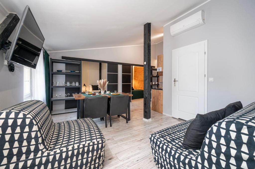 Kuchyňa alebo kuchynka v ubytovaní Kościelna Loft Apartaments