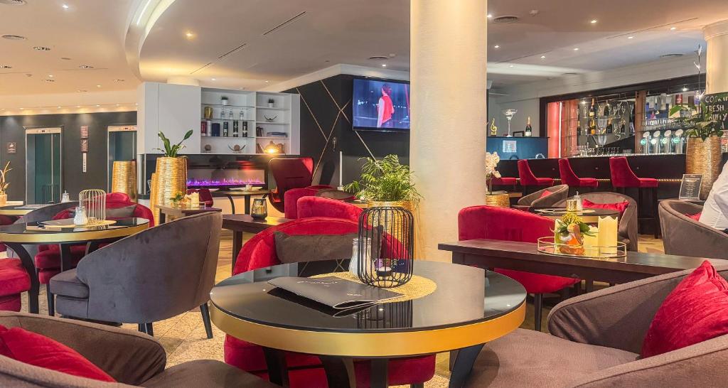 TV a/nebo společenská místnost v ubytování PLAZA Premium Wien