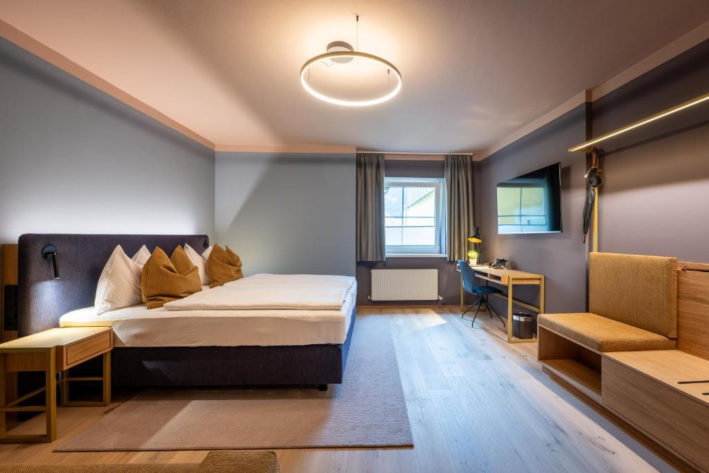 Postel nebo postele na pokoji v ubytování Hotel Zum Mohren