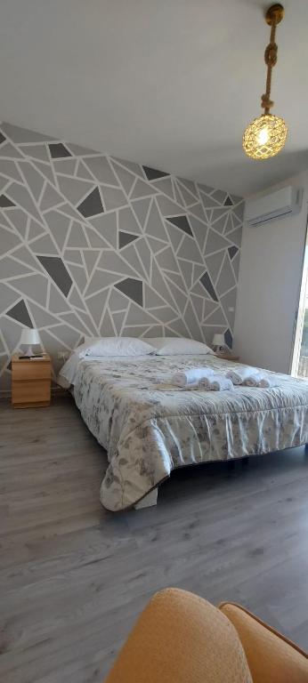 Postel nebo postele na pokoji v ubytování Casa Immacolata Affittacamere