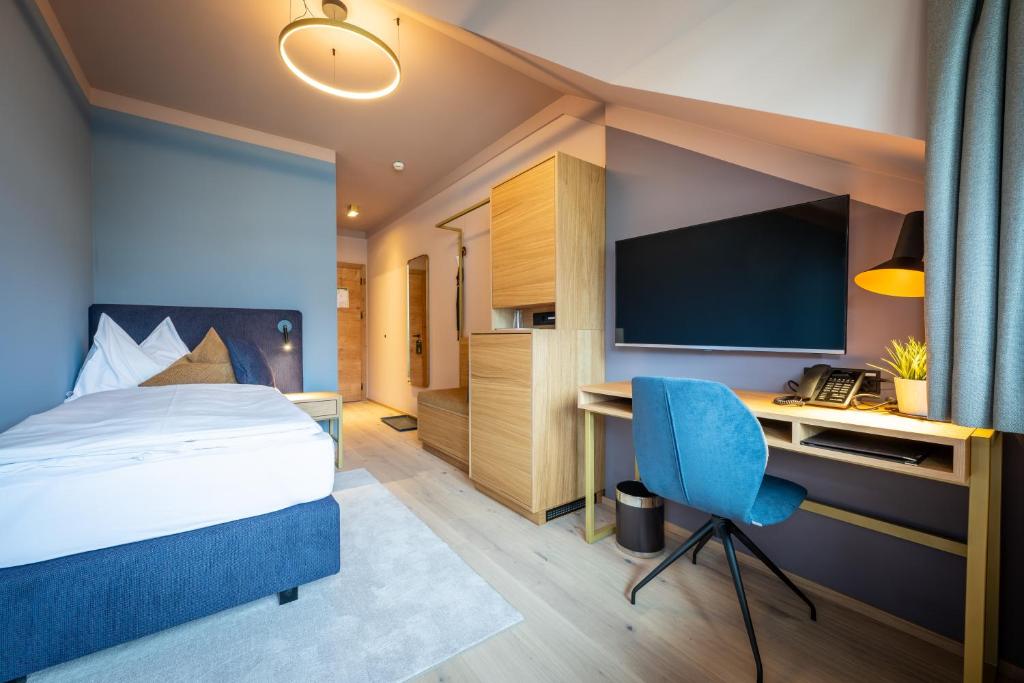 Postel nebo postele na pokoji v ubytování Hotel Zum Mohren
