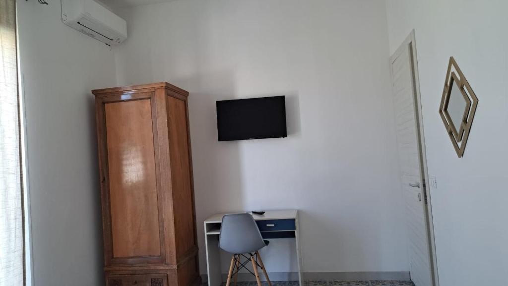 TV a/nebo společenská místnost v ubytování La riva